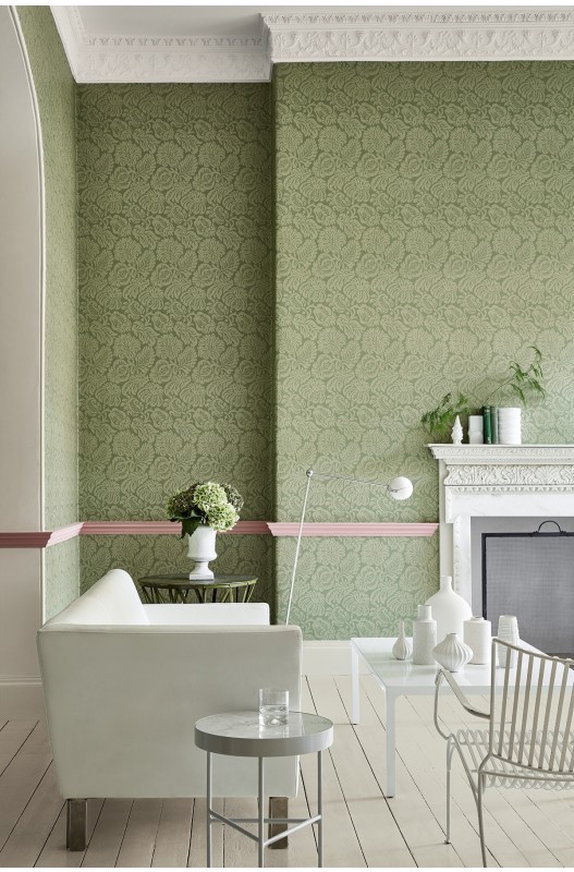 Pink dado rails against wallpaper 